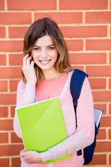 Beautiful young student in campus