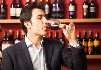 Sommelier tasting a glass of wine