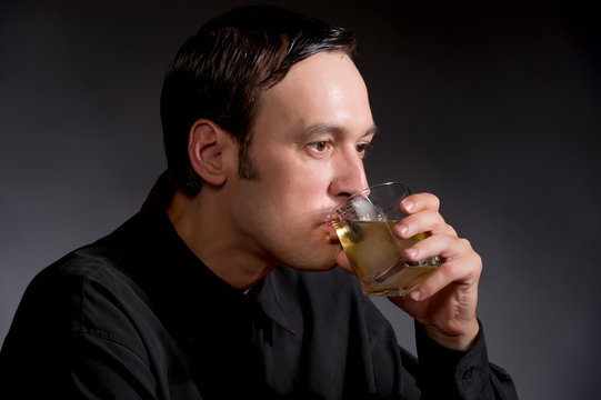 Man Drinking Whiskey