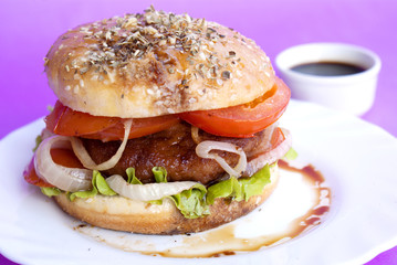 Burger with meat and baked vegetables