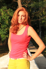 Obraz na płótnie Canvas Young pretty red hair woman outdoor fashion summer portrait 