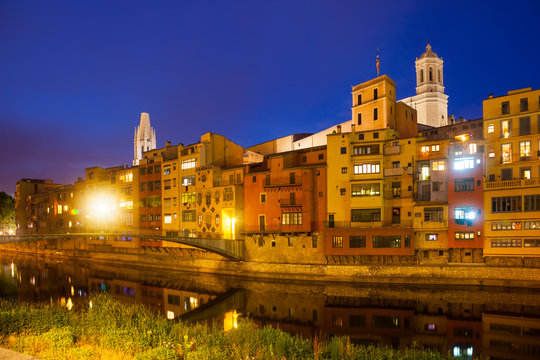 night view of  Onyar and picturesque houses in Girona