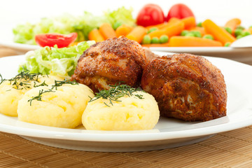 Roasted chicken legs with mashed potatoes