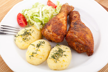 Roasted chicken legs with mashed potatoes