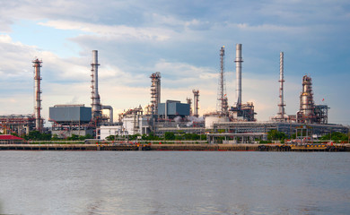 Fototapeta na wymiar Oil refinery factory at river Thailand