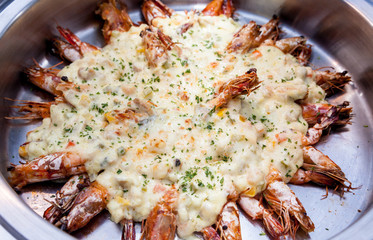 Baked shrimps with cheese for buffet.