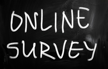 "online survey" handwritten with white chalk on a blackboard