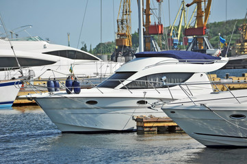 Fototapeta premium White motor yacht over harbor pier, Odessa, Ukraine