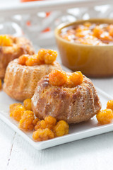 Cupcake dessert with cloudberries