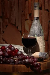 Fotobehang Composition with old bottle of wine and wineglass in old © Africa Studio
