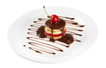 Tasty biscuit cake with chocolate and berry