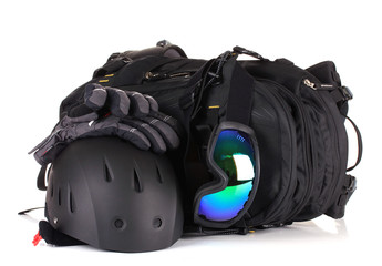 Winter sport glasses, helmet and gloves, backpack, isolated