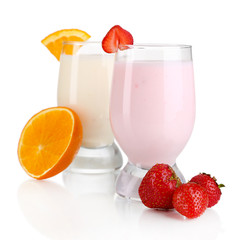 Delicious milk shakes with orange and strawberries isolated