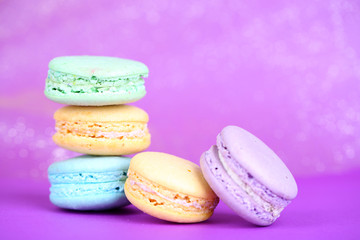 Macaroons on fabric background