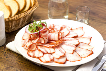 plate of bacon on the table in a restaurant