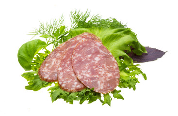 Sausages with salad and basil