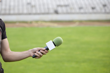 Reporter takes interview after the match