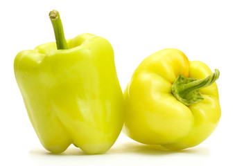 fresh green bell peppers isolated on white