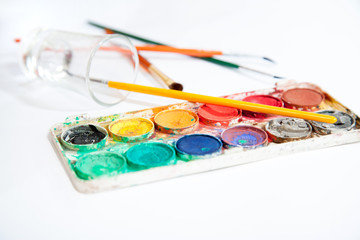 Obraz premium watercolors paint box with brush