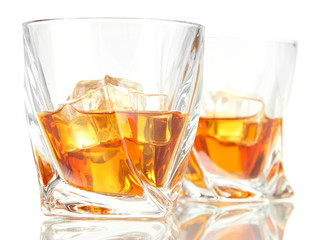 Two glasses of scotch whiskey, isolated on white