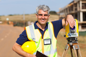 middle aged land surveyor outdoors