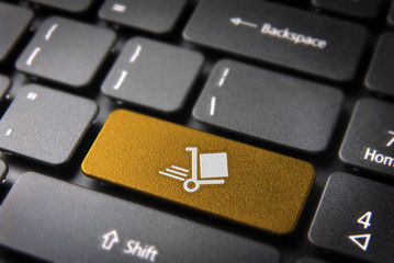 Gold Shipping cart keyboard key, Business background