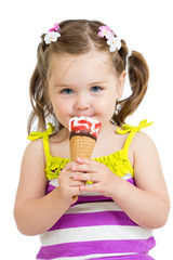 kid girl eating ice cream in studio isolated