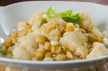 Vegetables curry with cauliflower, chickpeas and spring onions