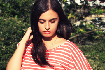 Fototapeta premium Stylish brunette girl in an urban style 