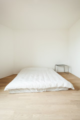 Fototapeta na wymiar interior new house, bedroom with a mattress