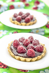 Sweet  bucket with chocolate and raspberries