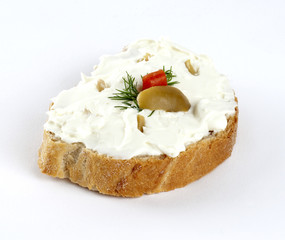 cheese spread with olives on bread