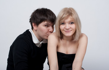 beautiful young bride and groom kissing