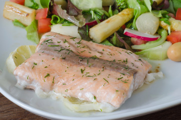 Grilled salmon with lemon and asparagus salad