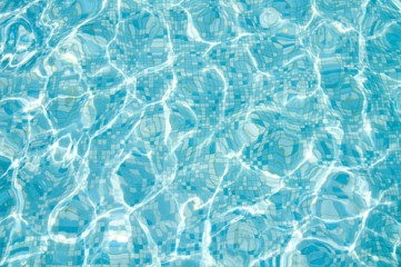 sunny reflections on summer swimming pool
