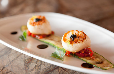 Grilled scallops with zucchini.