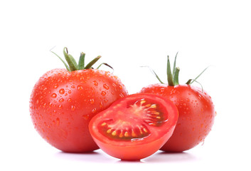 Two red ripe tomatoes and slice isolated