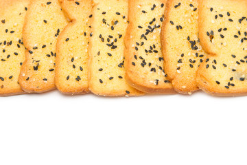 Baked bread, buttered and sesame