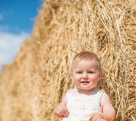 baby on hay