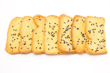 Baked bread, buttered and sesame