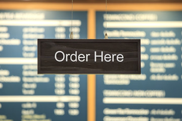 A photograph of a fast food ordering speaker taken