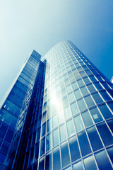 Fototapeta premium exterior of glass residential building. Modern glass silhouette