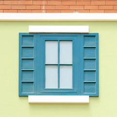 vintage windows on the green wall