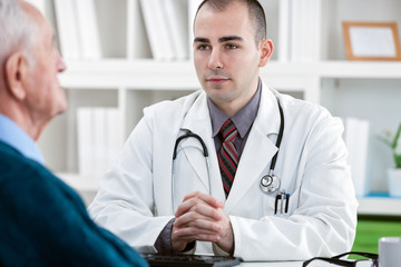doctor talking to patient