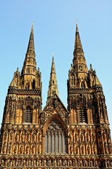 Fototapeta premium West front of Lichfield Cathedral, England © Arena Photo UK