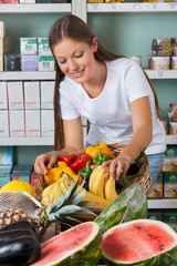 Woman Shopping Fruits And Vegetables In Supermarket