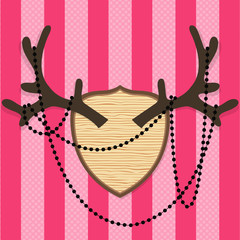 Vector vintage style antler with beads on pink