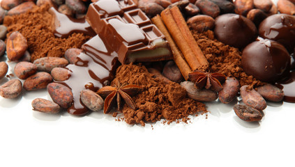 Composition of chocolate sweets, cocoa and spices, isolated