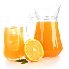 Glass and pitcher of orange juice isolated on white