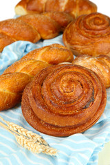 Fototapeta premium Composition with buns, on color napkin, close up